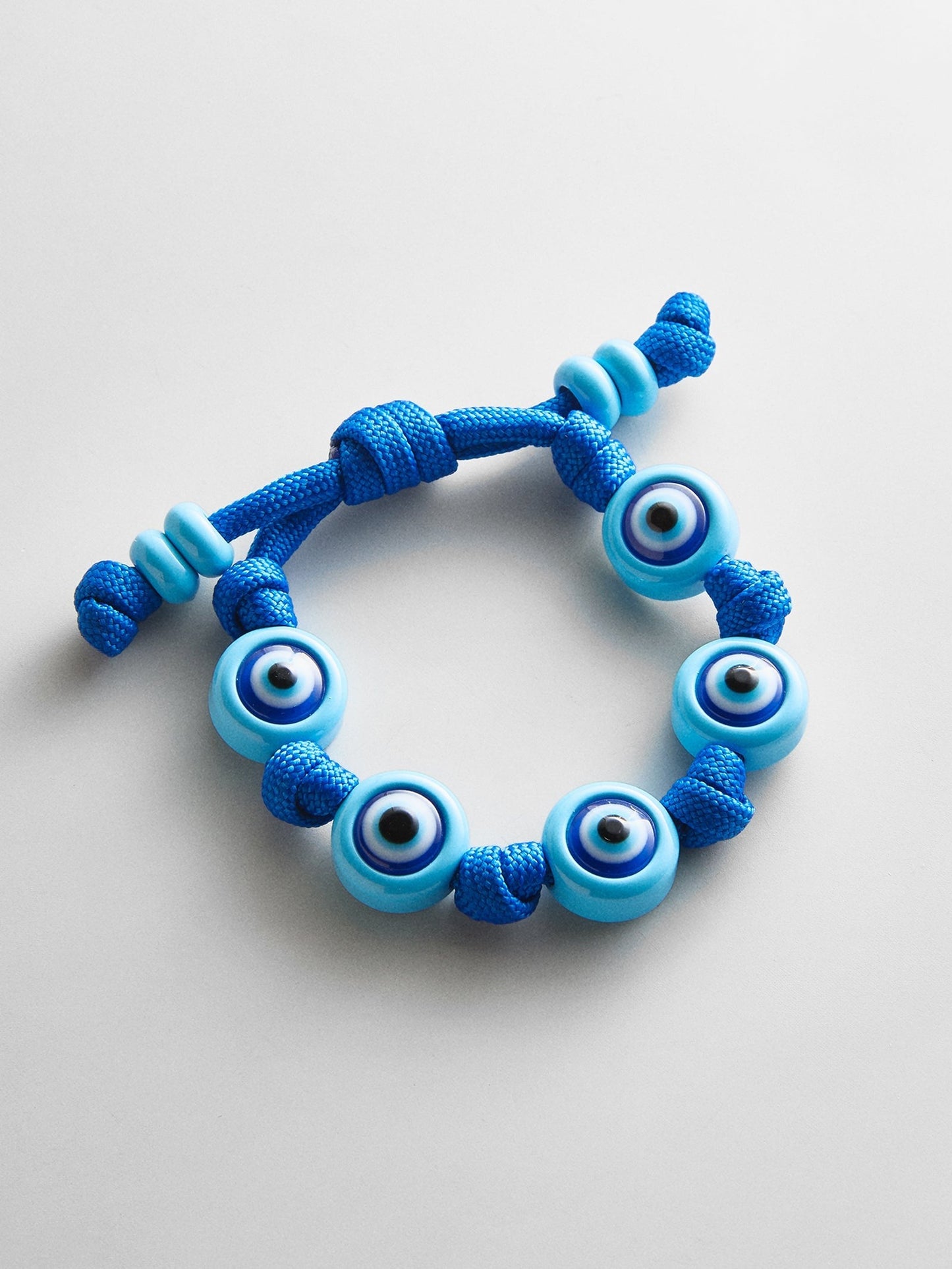 Knotty Good Eye Cord Bracelet - Aqua