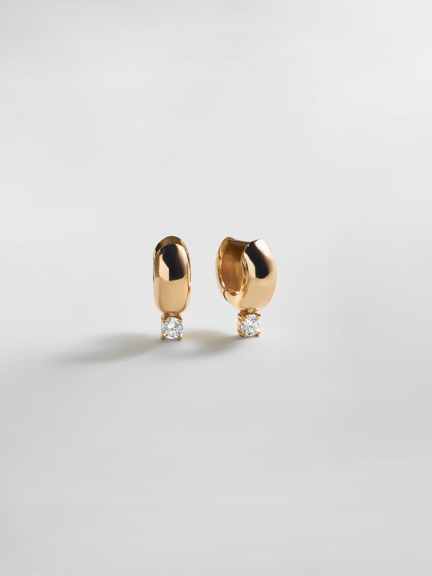Kourtney Huggie Earrings - Kourtney Gold Plated Brass Earrings
